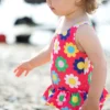 Frugi Pink Flower Power UPF 50+ Nappy Swimsuit